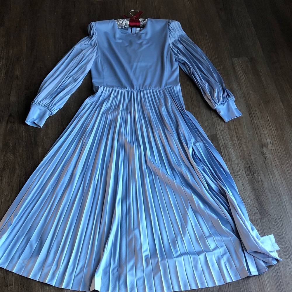 Marella longsleeved maxi pleated dress in light blue.